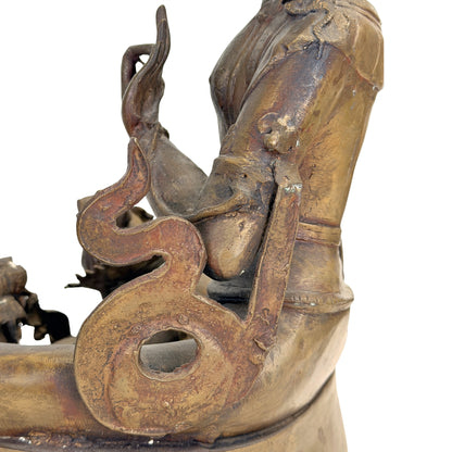 Detail van gelaatstrekken en historische patina van de Nepalese Mañjuśrī