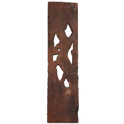 Achterkant van een antieke Balinese houtsculptuur met historische oxidatie en houtnerf