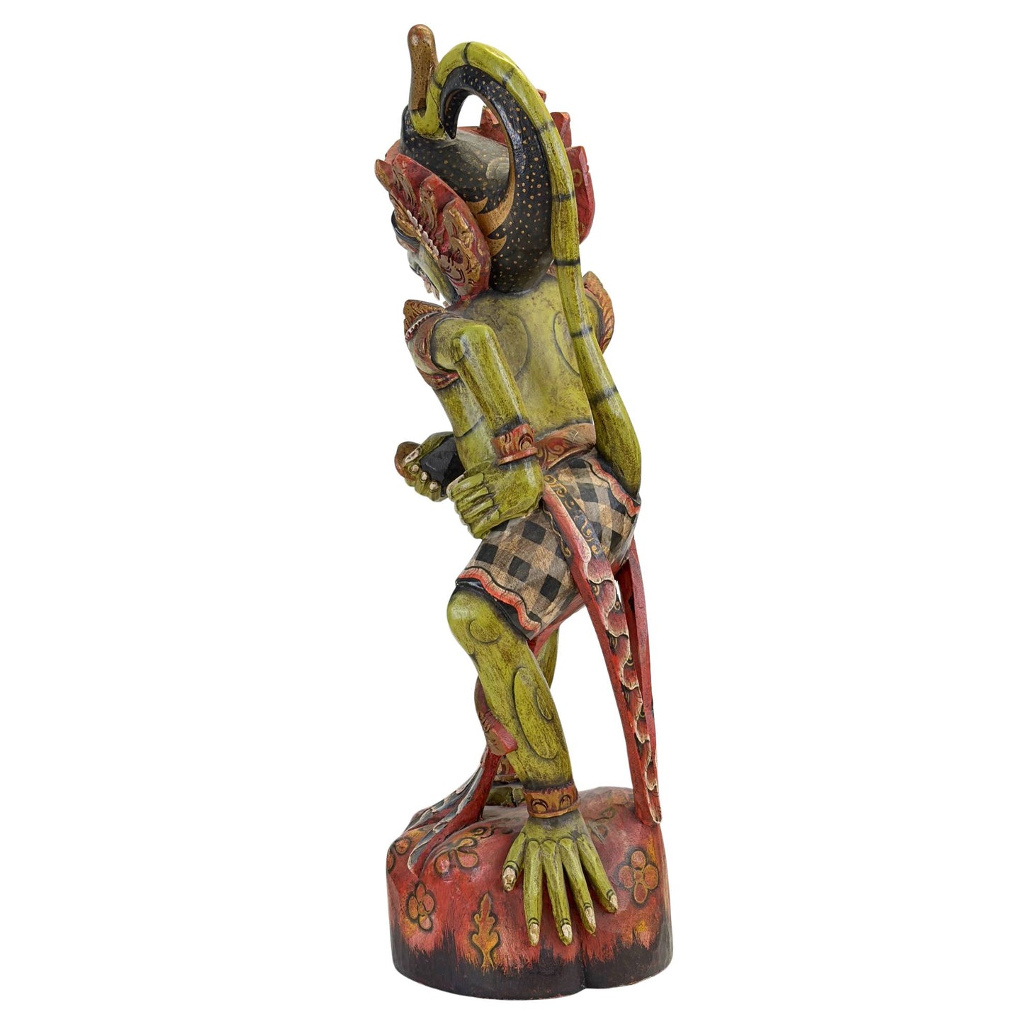 Zijaanzicht van de houten Hanuman kris drager met de karakteristieke verticale hoektanden en koninklijke kroonvleugels