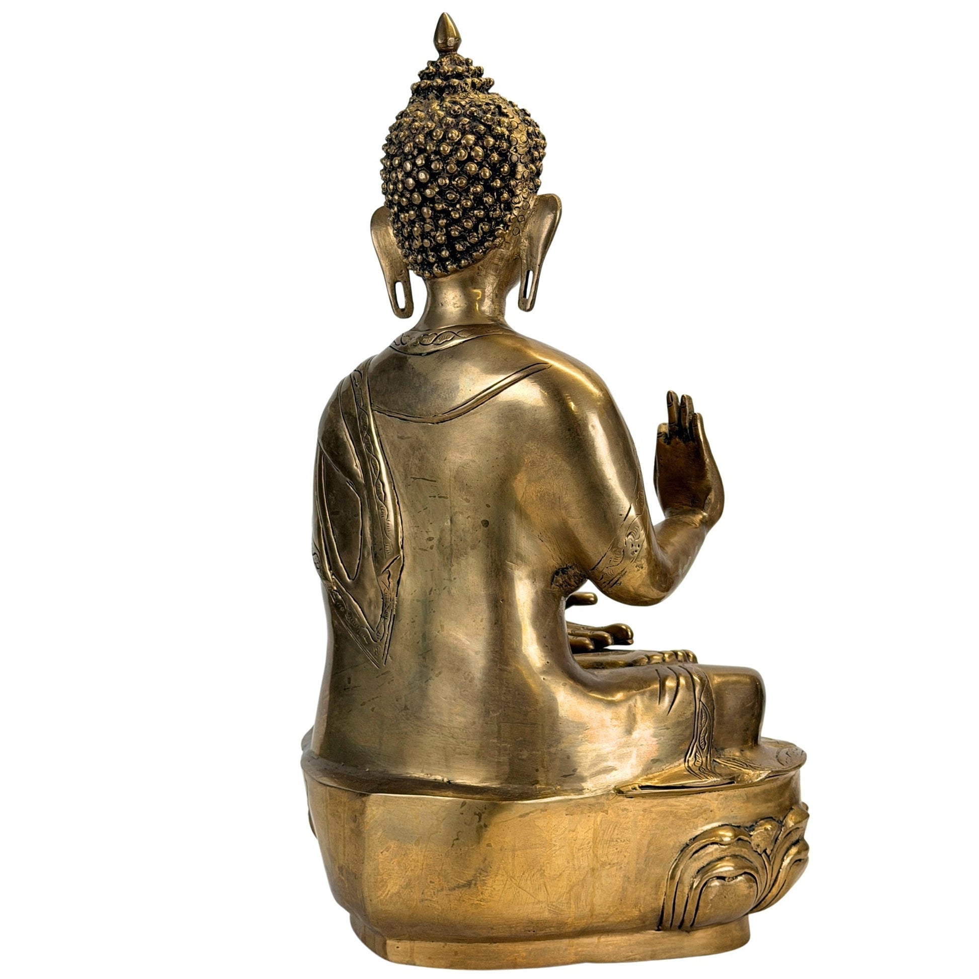 Schuin achteraanzicht van de antieke bronzen Shakyamuni Boeddha