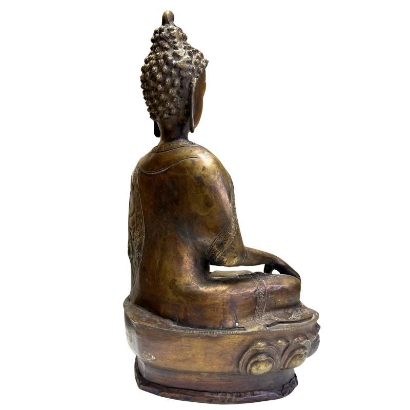 Achterzijde van een antieke bronzen boeddha uit de Himalaya regio