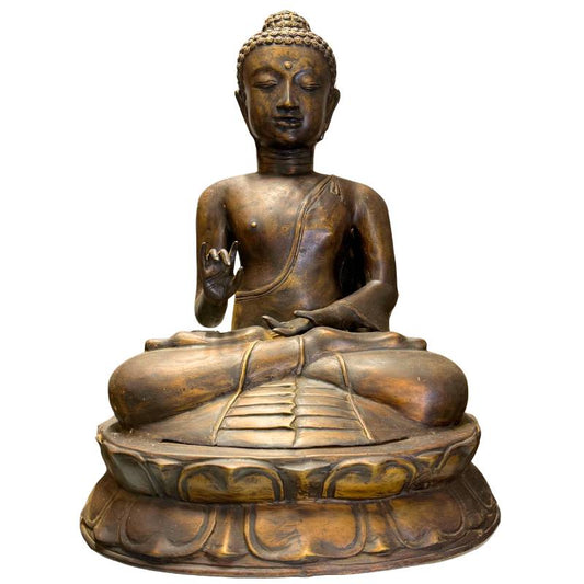 Monumentaal antiek Javaans bronzen beeld van de Boeddha in Vitarka Mudra.
