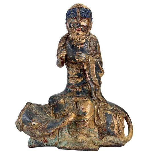 Arhat zittend op Dano dier in bronzen Himalaya beeld