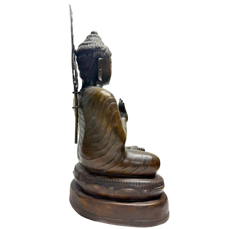 birmese boeddha dharmachakra mudra bronzen beeld hand detail met wiel symbool onderwijzende houding
