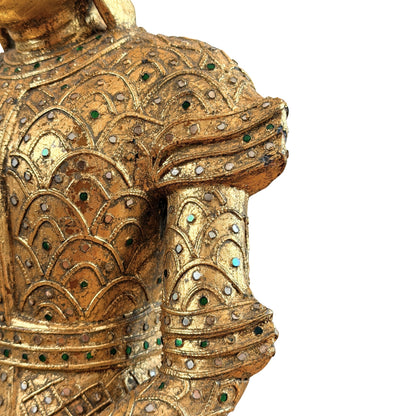 Close-up van de rugdecoratie met verguld reliëf en gekleurde glasinleg