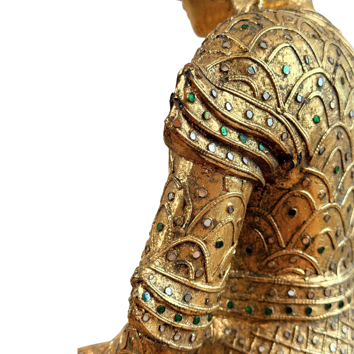 Detail van de linker schouder en bovenarm met glasinleg