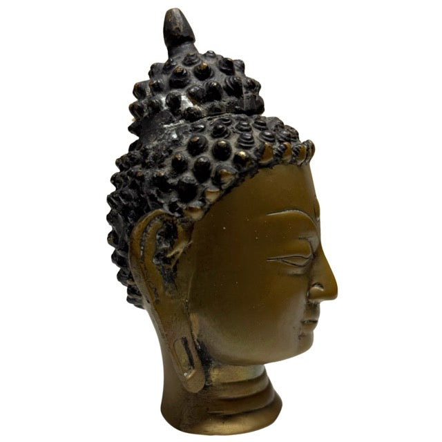 Pre-industrieel vuurverguld boeddhahoofd uit Nepal met zichtbare ouderdom en slijtage