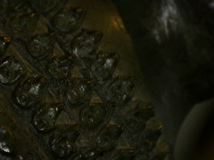 Microscoopfoto van microtextuur en patina op Thaise bronzen kunst