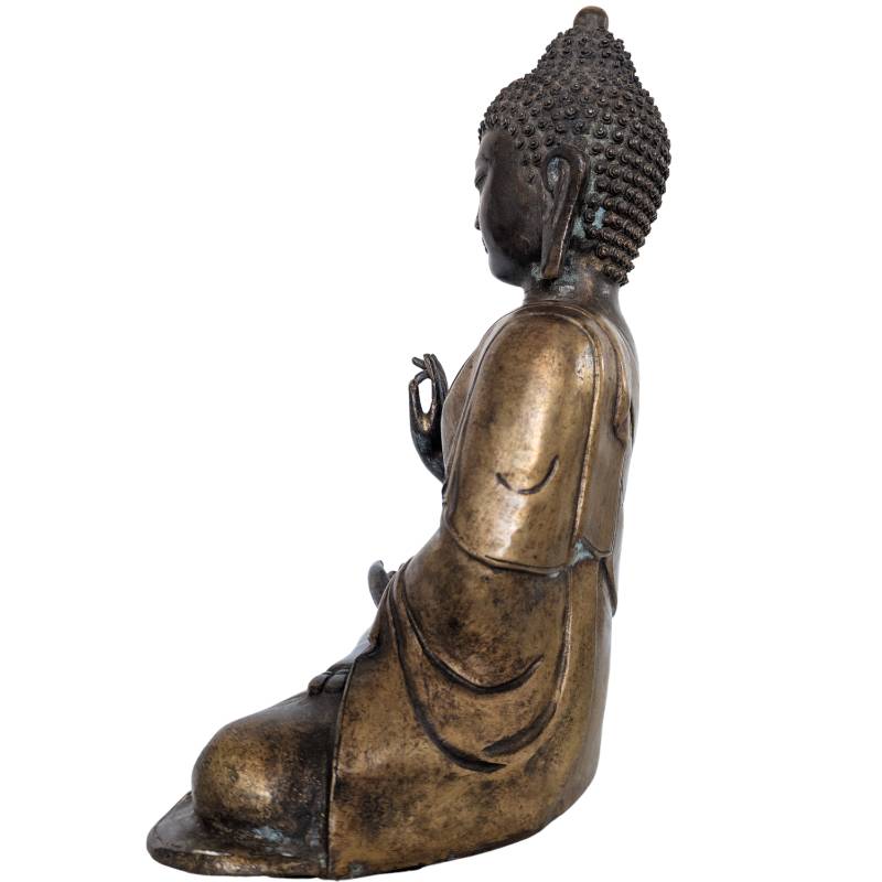 Detail van het hoofd met haarstructuur en lakmarkering op Chinees Boeddhabeeld