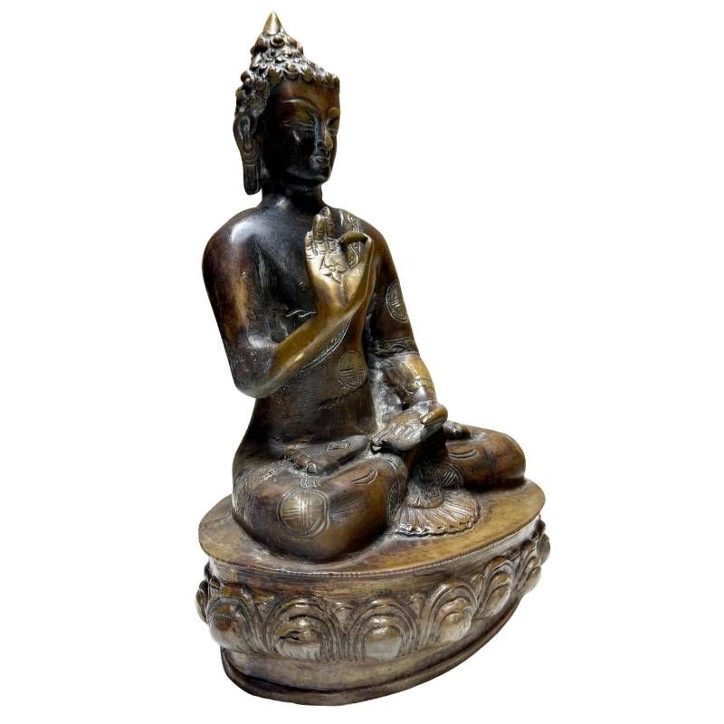 Antieke Nepalese bronzen Boeddha met Vitarka mudra en natuurlijke patina