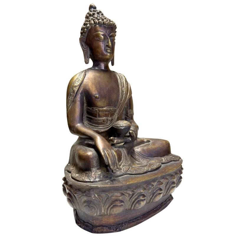 Voorzijde van antieke bronzen Medicijnboeddha met natuurlijke patina