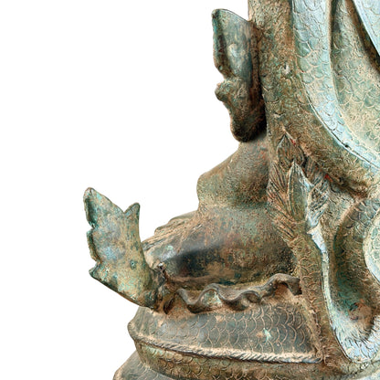 Detail van het zijornament, de rugzijde en de opgerolde naga-basis