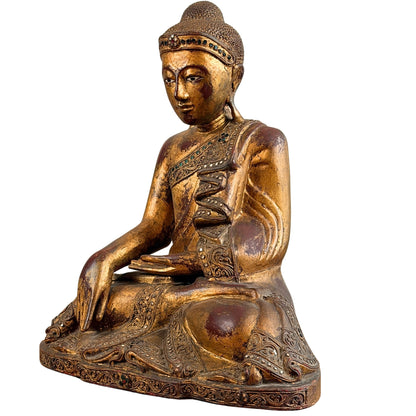 Zijaanzicht van de rechterhand in bhumisparsha mudra