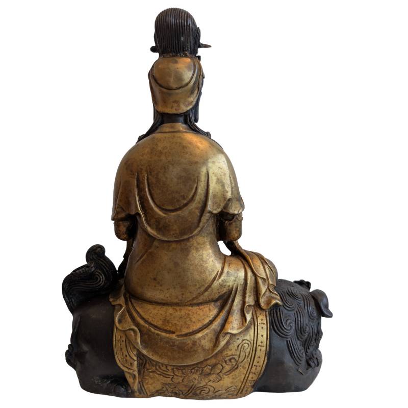 Chinese bronzen Guanyin met beschermende leeuw