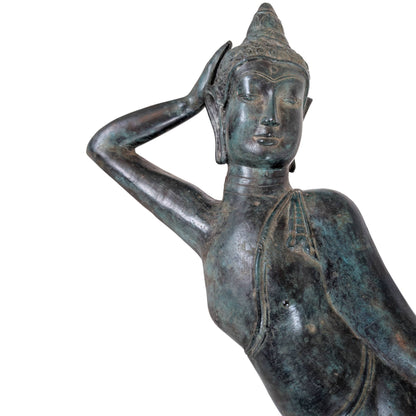 Detail van het gezicht van een Thaise Boeddha met zichtbare resten van vergulding en patina