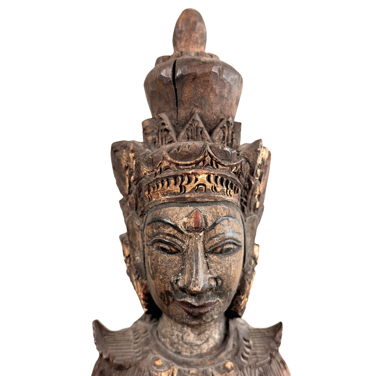 Gezicht en kroon van het Balinese dewabeeld, rode urna op het voorhoofd