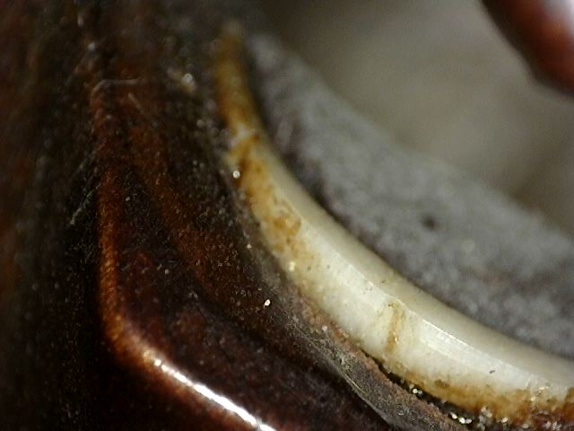 Guanyin maskerhoofd in hout met tanden van bot