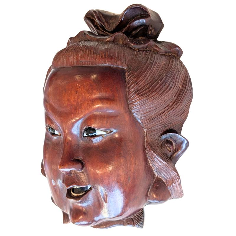 Guanyin maskerhoofd in hout uit China met ingelegde ogen