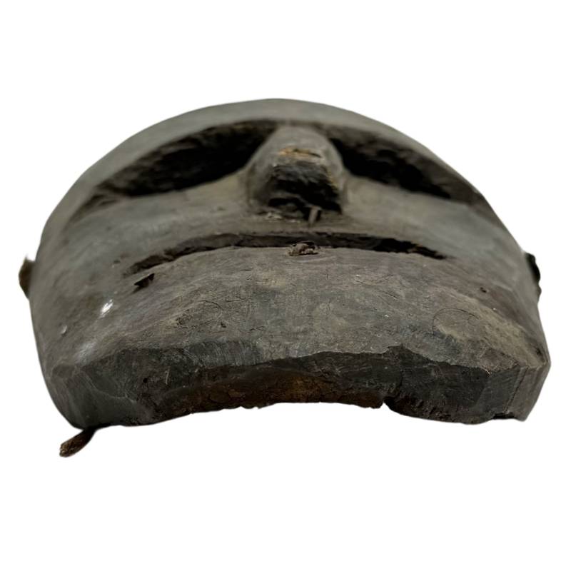 Handgesneden Himalaya houten masker uit Nepal met krachtige expressie