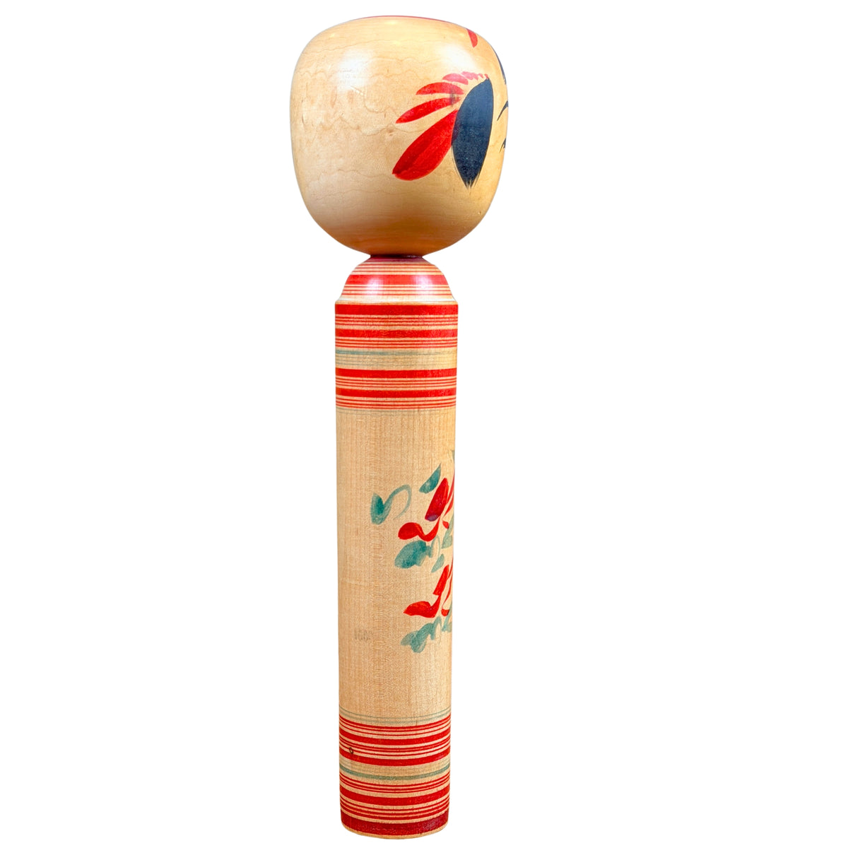 Japanse kokeshi met bloemen, zijaanzicht