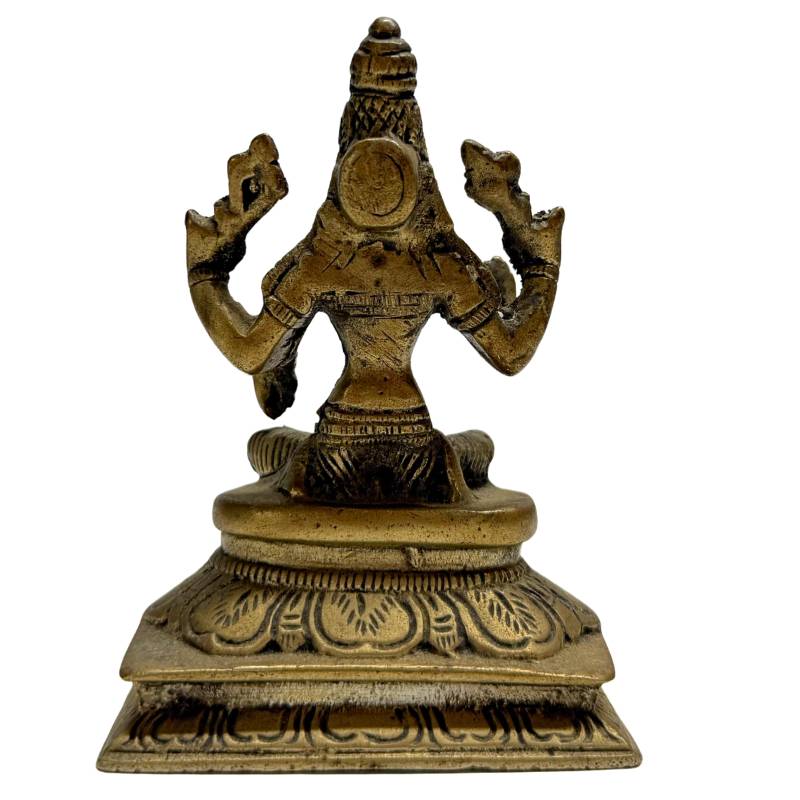 Bronzen Lakshmi beeld in lotus zitpositie op sierlijke troon
