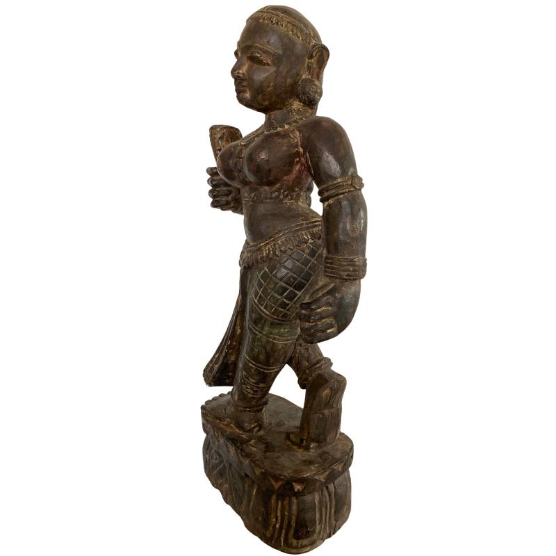 Antique Indian wooden temple figure with old red and black polychromy