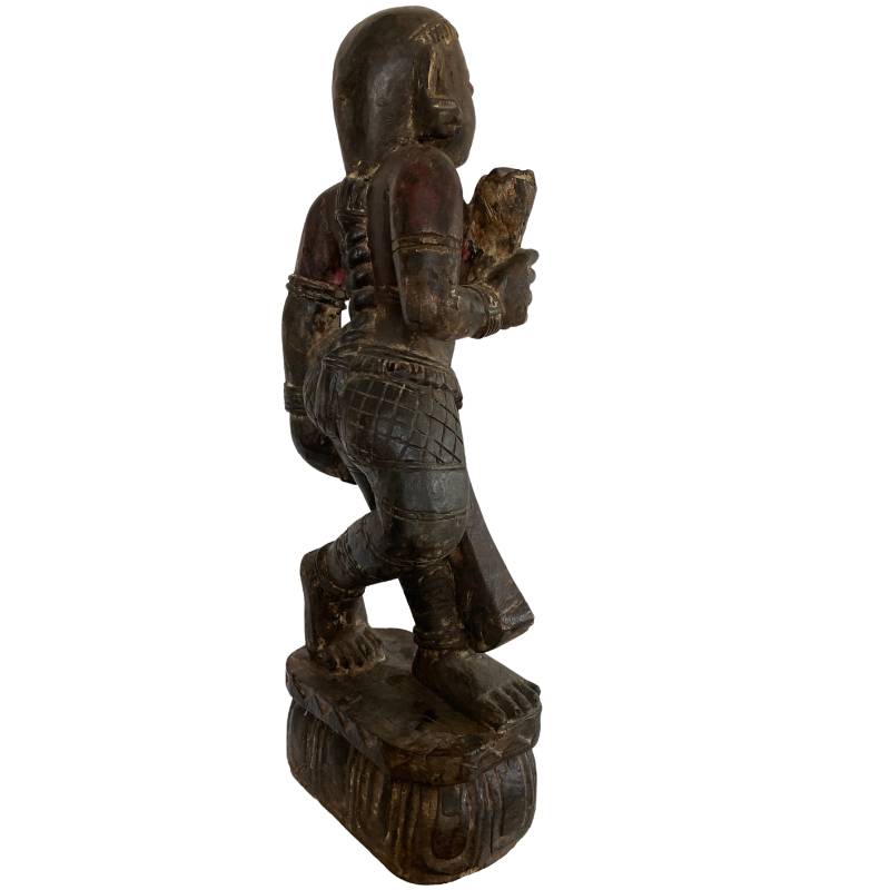 Craquelure and aged polychromy on Indian wooden temple figure