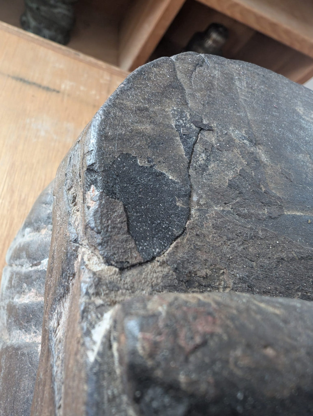 Solid carved wood and tool marks on antique Indian sculpture