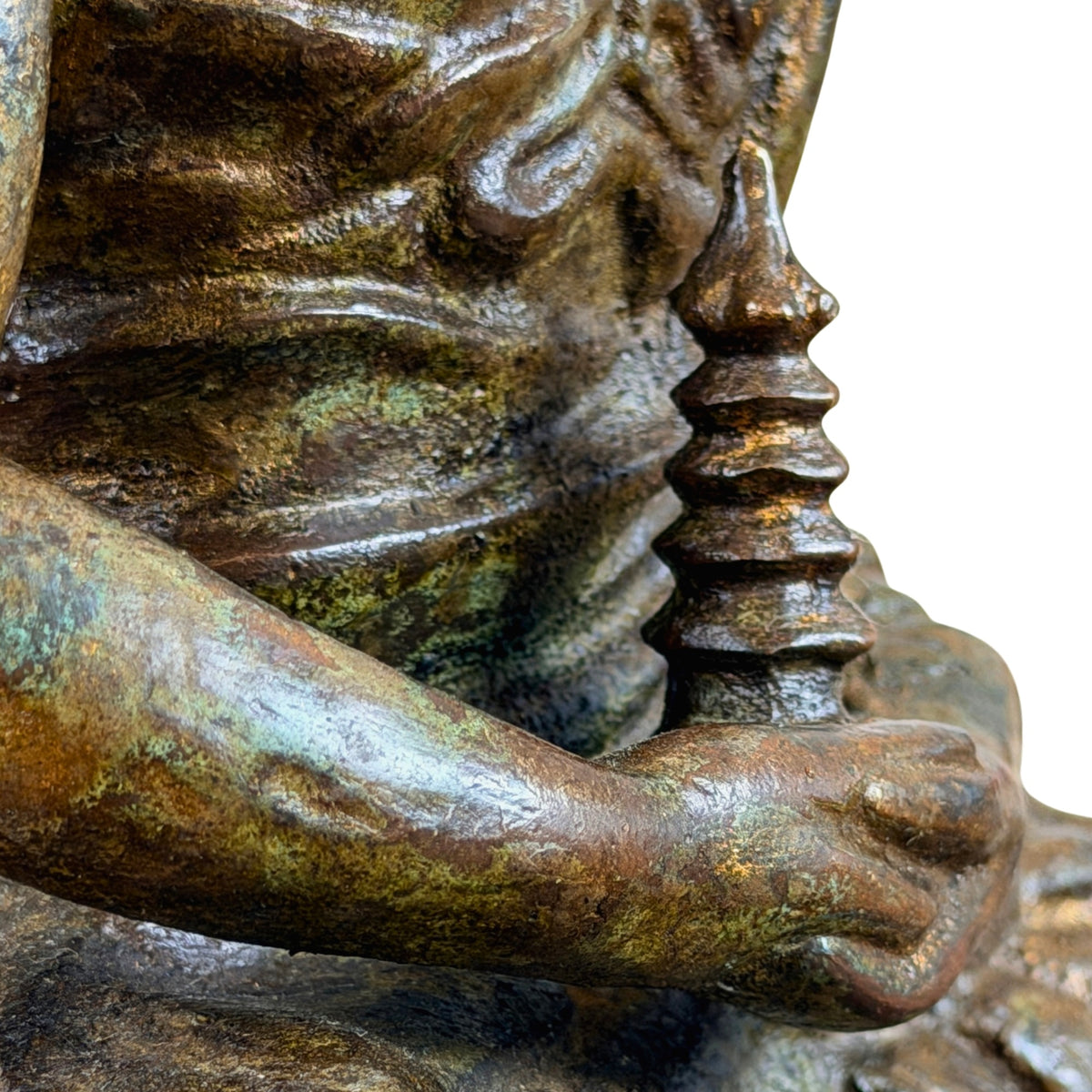 Detail van stupa en arm vanuit de zijkant