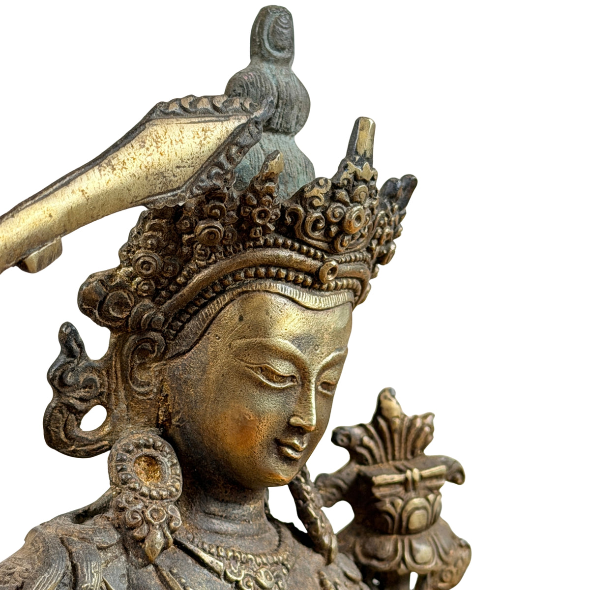 Manjushri schuin van voren met gezicht, kroon en boek op de lotus