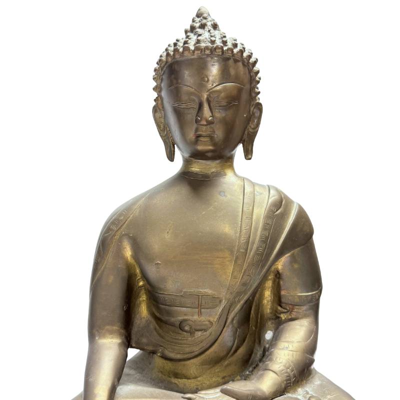 Himalaya Boeddha in bhumisparsha mudra met verguld oppervlak