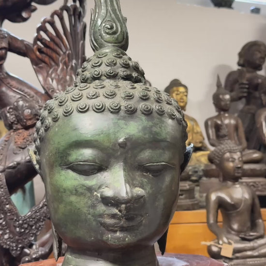 groot antiek boeddha hoofd in brons met authentieke uitstraling