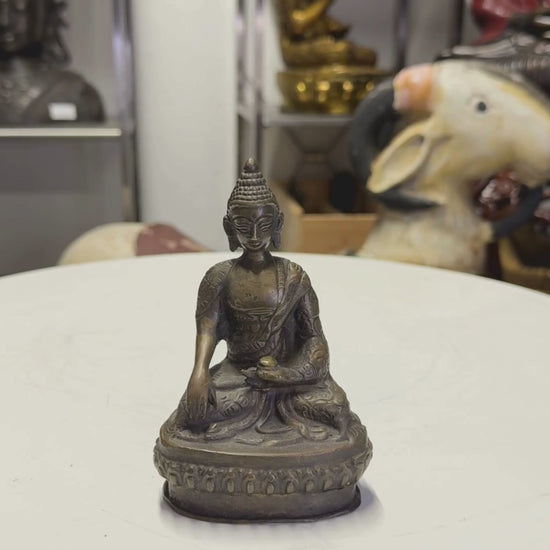Video van de Boeddha in de hand om de massieve kwaliteit te tonen.