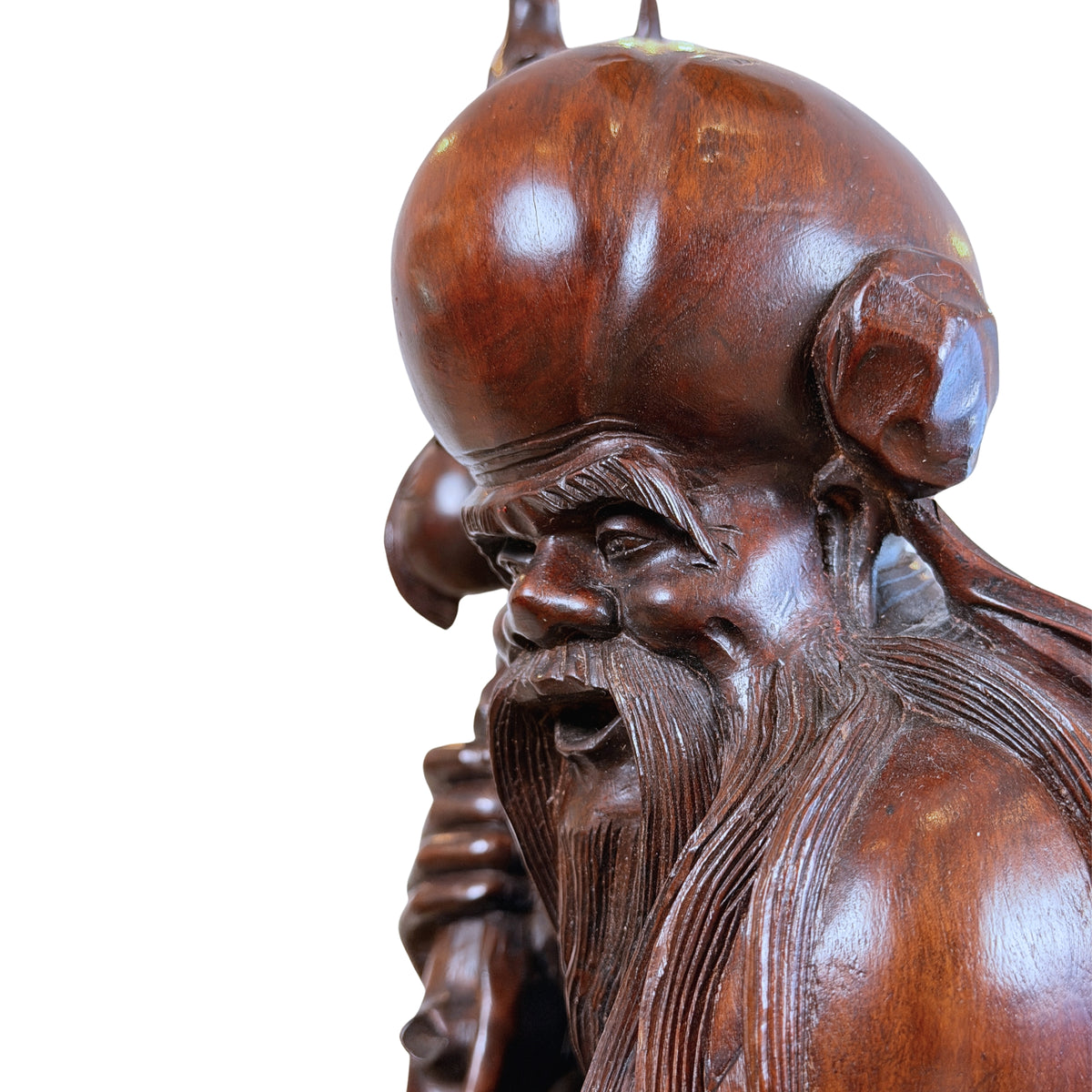 Glimlachend gezicht en lange baard van Shou Lao, half profiel