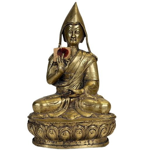 Vuurvergulde Tibetaanse Gelug lama met pandita-hoed, onderrichtsgebaar en religieuze tekst
