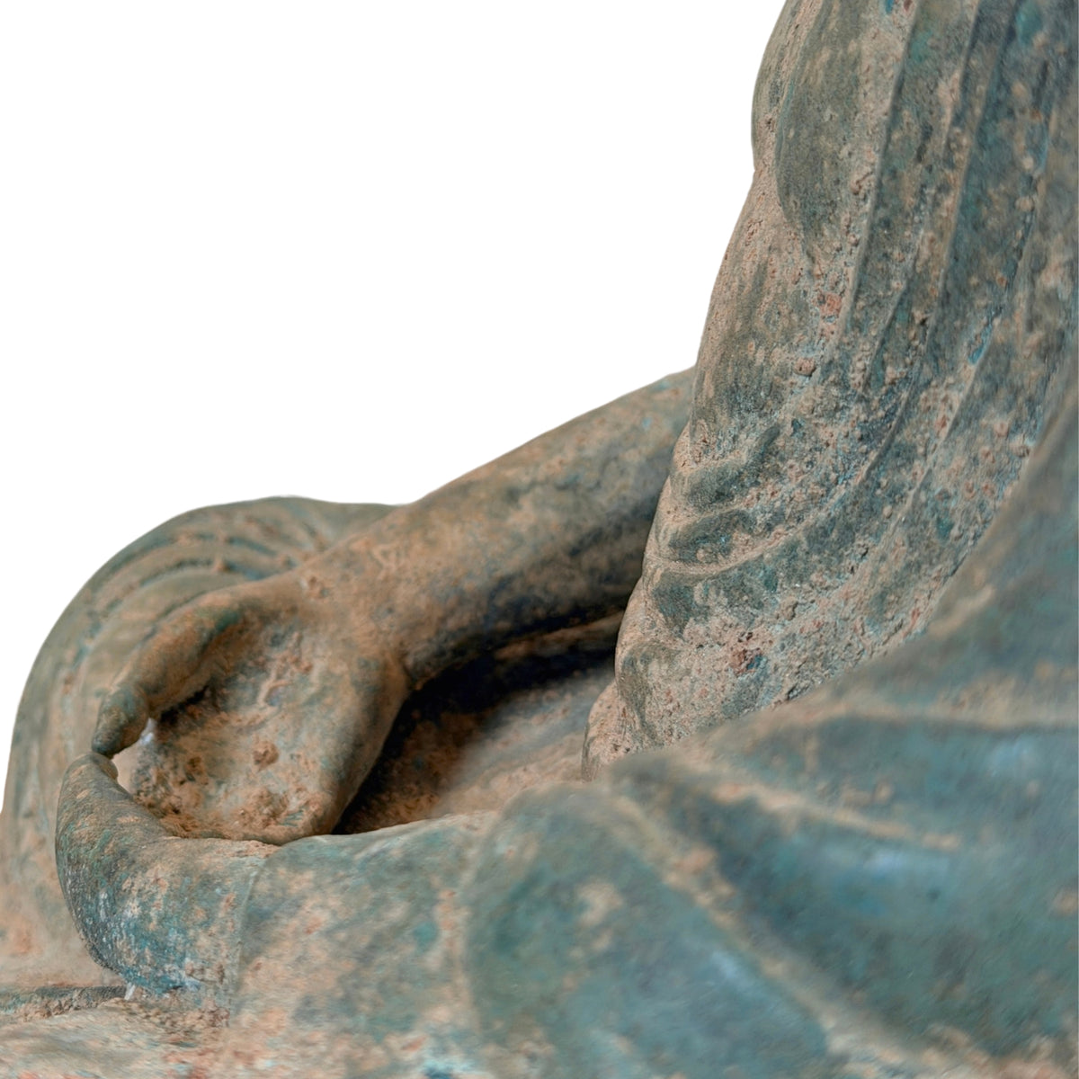 Hand en onderarm rustend in de schoot, zijdetail