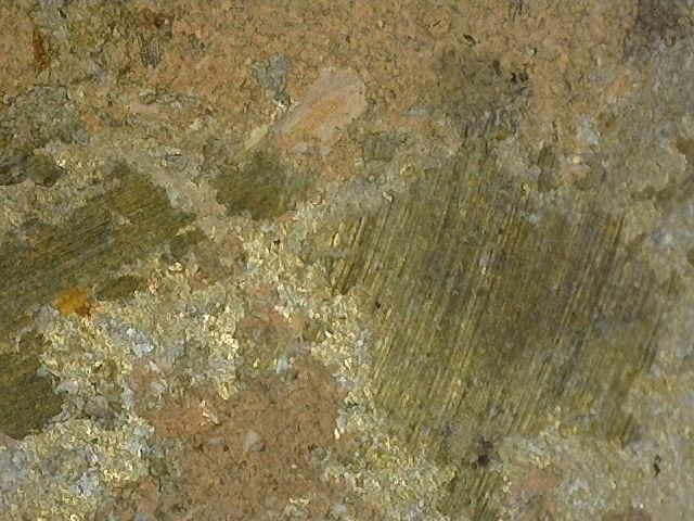 Vergroting van natuurlijke corrosiestructuur zonder moderne coating op Vishnu borstbeeld in brons