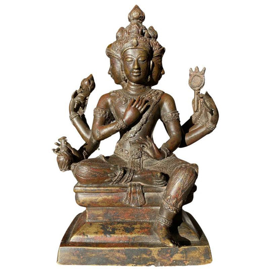 Vuurverguld bronzen Brahma-beeld met vier gezichten en zes armen, zittend op sokkel